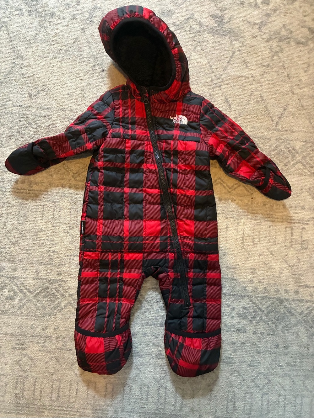 The North Face Red and Black Plaid Hooded Baby One-Piece